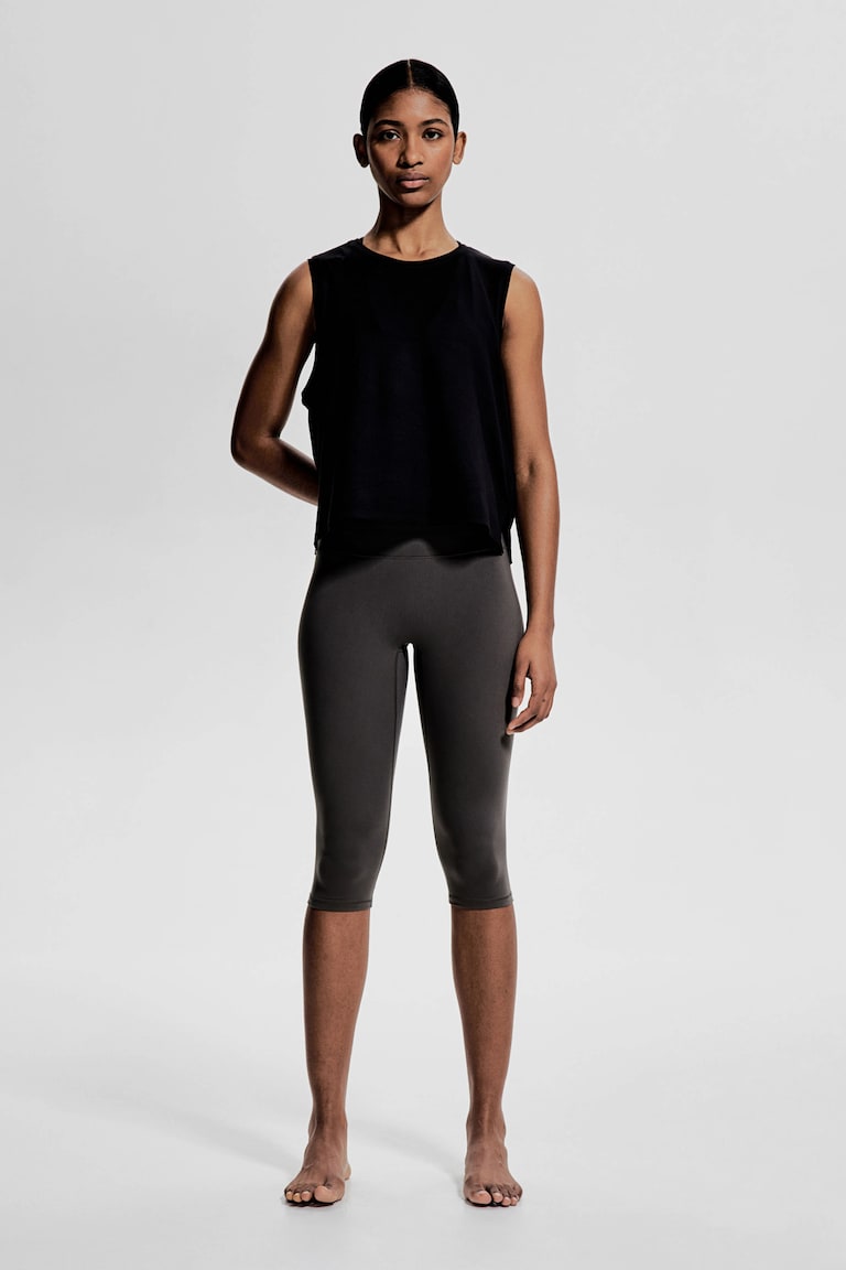 H&M Kastiges Sport-Tanktop mit DryMove™ Vierteljährliche Förderung