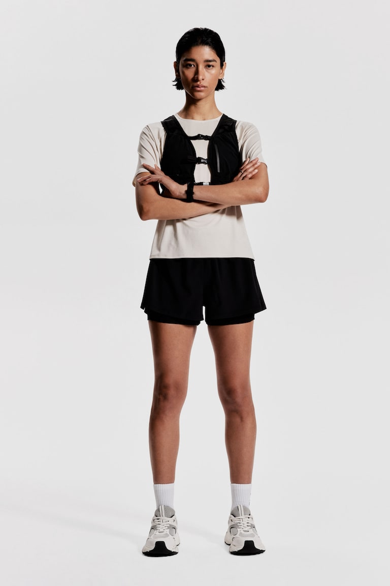 H&M Doppellagige Laufshorts mit DryMove™ Begrenztes Angebot