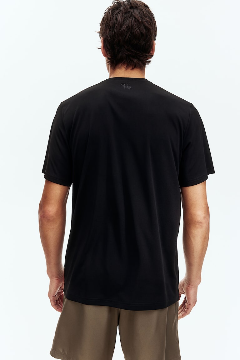 H&M Sportshirt mit DryMove™ in Regular Fit Lagerräumung