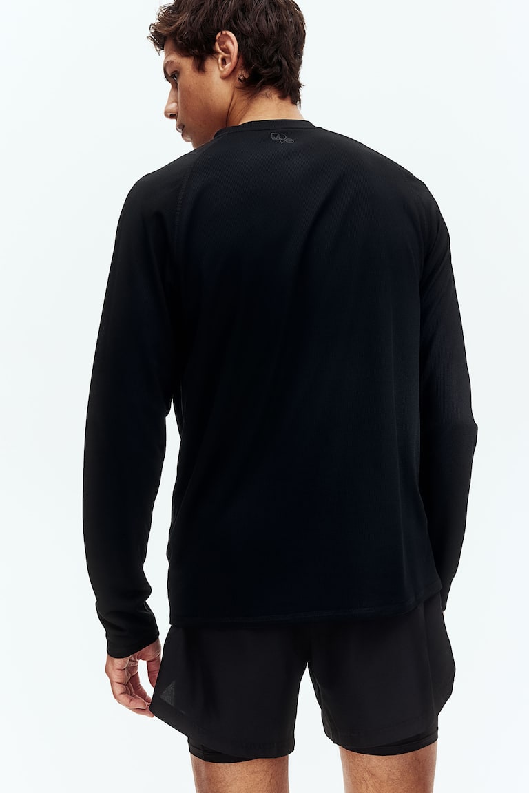 H&M Doppellagige Sportshorts mit DryMove™ Super Sparpreis