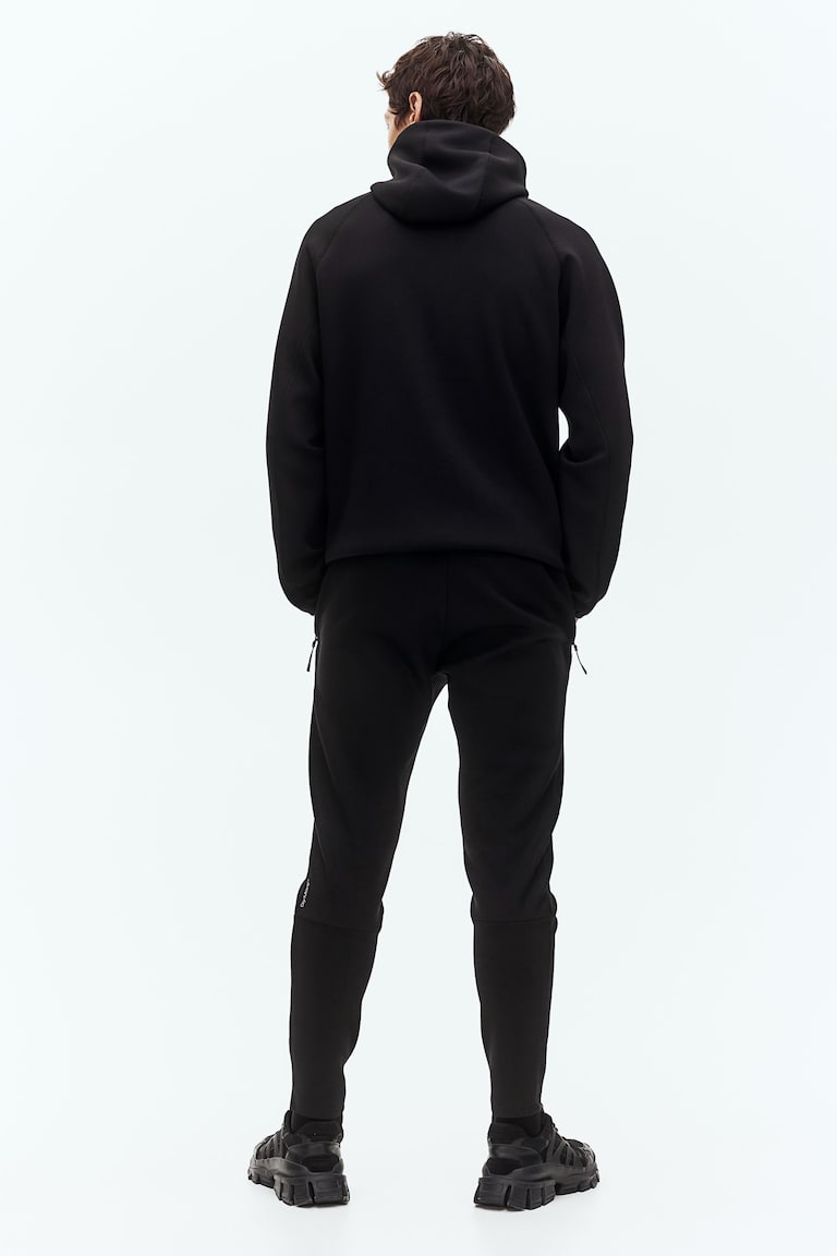 H&M Sport-Joggpants mit DryMove™ in Slim Fit Bis zu 60% Rabatt