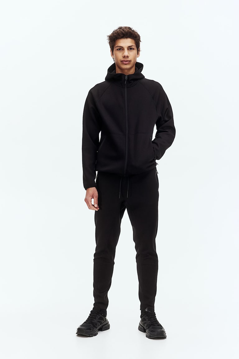 H&M Sport-Joggpants mit DryMove™ in Slim Fit Bis zu 65% Rabatt