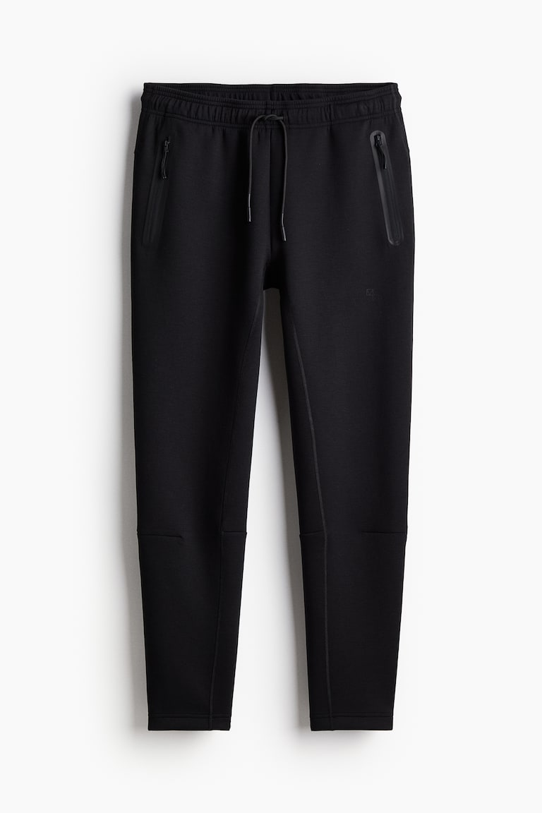 H&M Sport-Joggpants mit DryMove™ in Slim Fit Bis zu 65% Rabatt