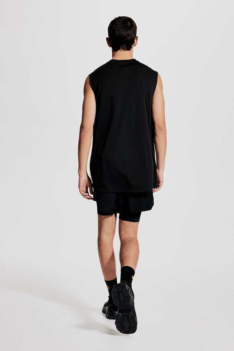 H&M Sport-Tanktop mit DryMove™ in Regular Fit Sonderangebot der Fabrik