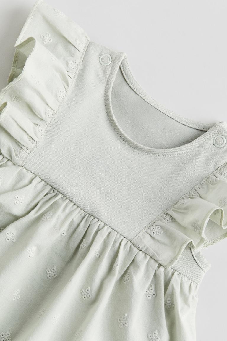 H&M Bodykleid mit Volants Fabrikverkauf