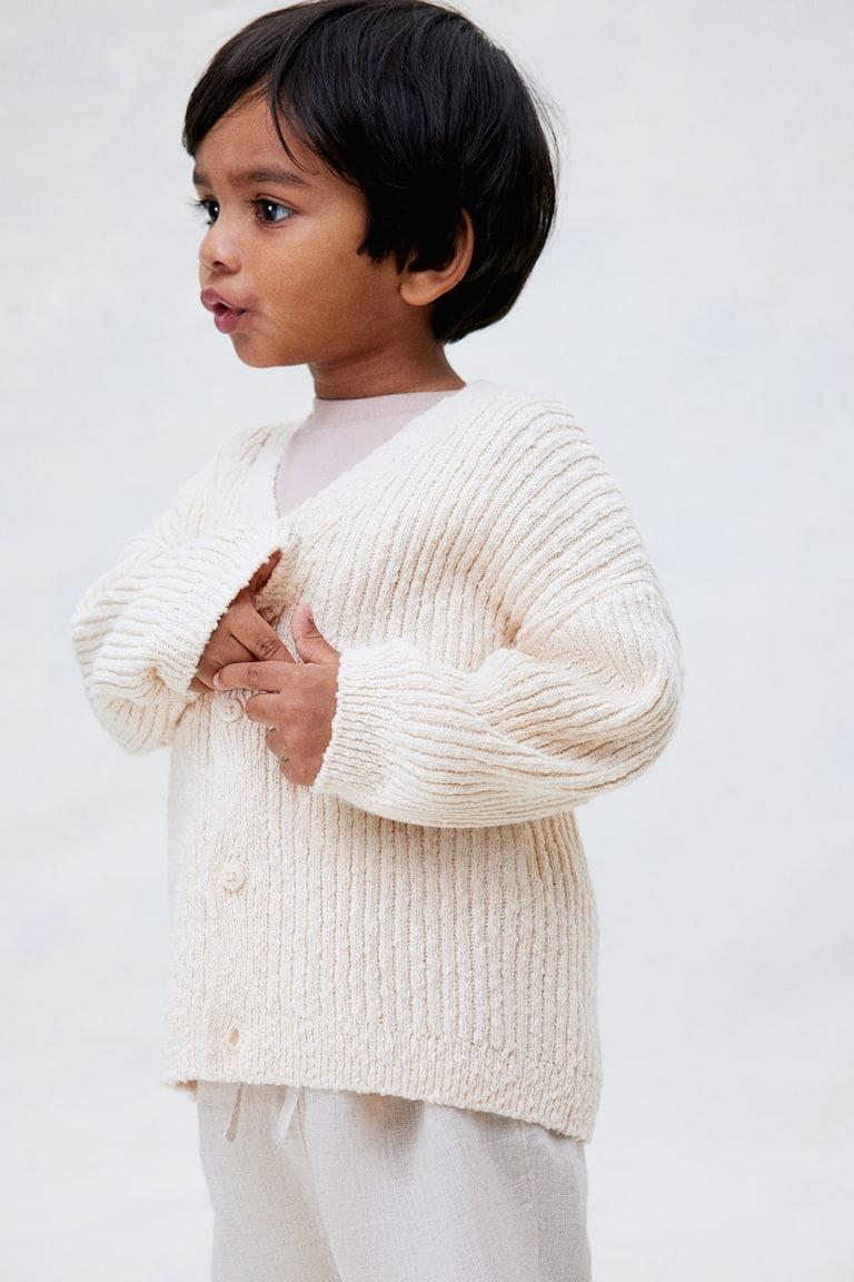 H&M Oversized Cardigan aus Boucléstrick Große Rabatte