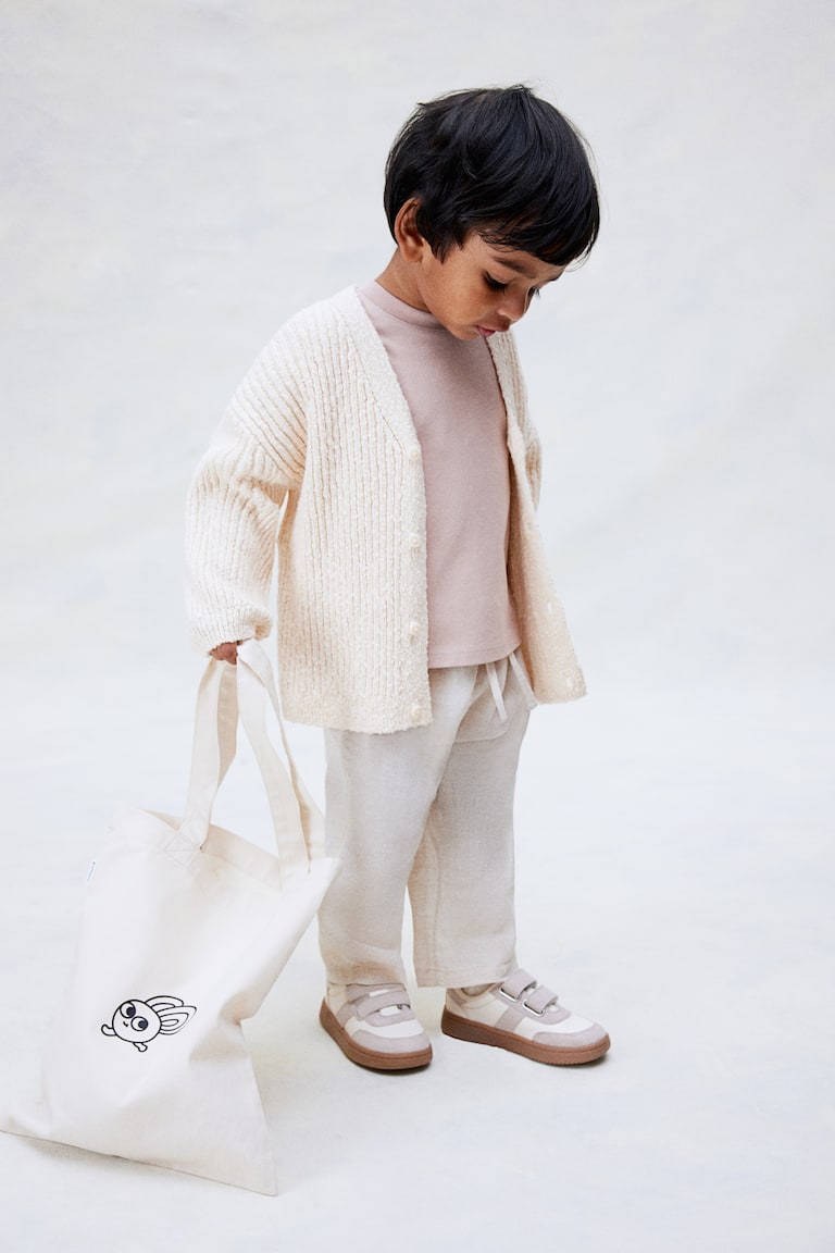 H&M Oversized Cardigan aus Boucléstrick Große Rabatte