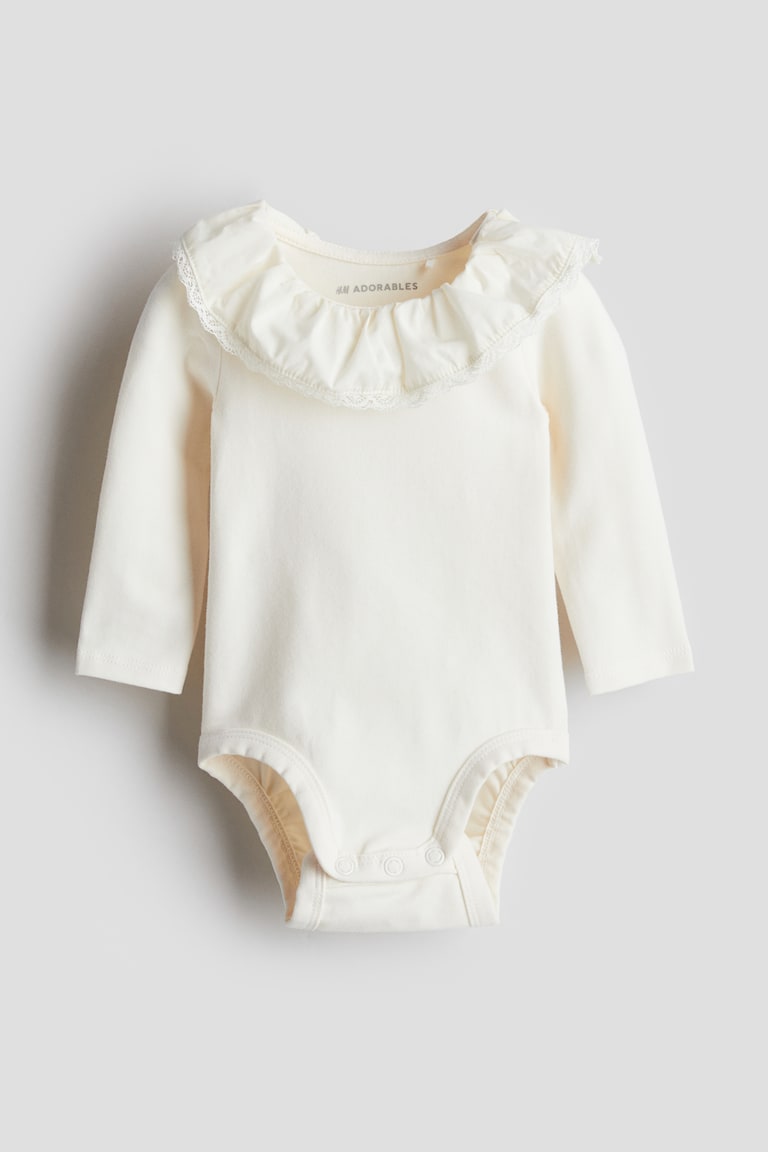 H&M Body mit Volantkragen JETZT KAUFEN