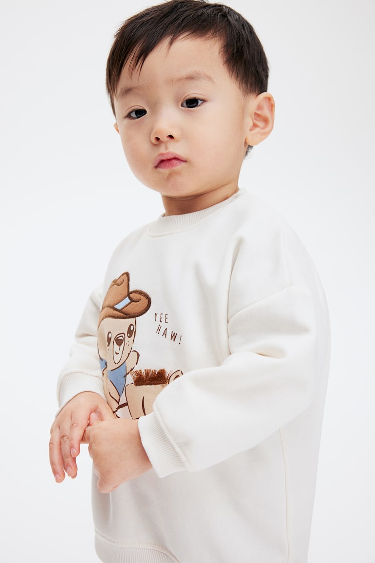 H&M Sweatshirt mit Motiv Outlet