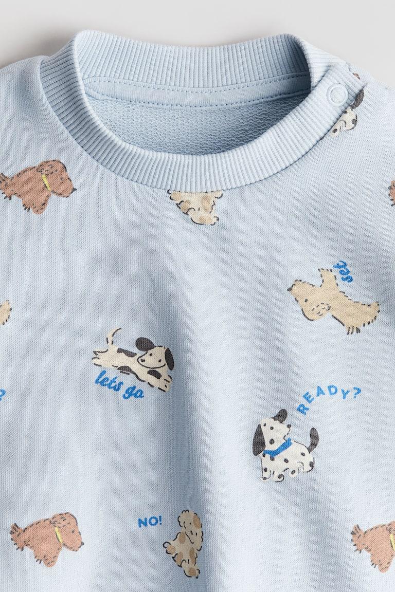H&M Sweatshirt mit Print Blitzverkäufe