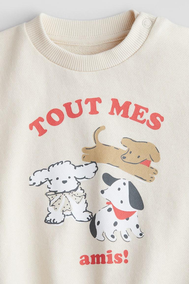 H&M Baumwollsweatshirt mit Print Exklusivangebot