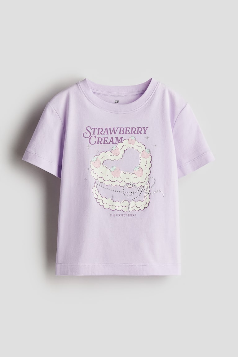 H&M T-Shirt mit Motiv Riesige Rabatte