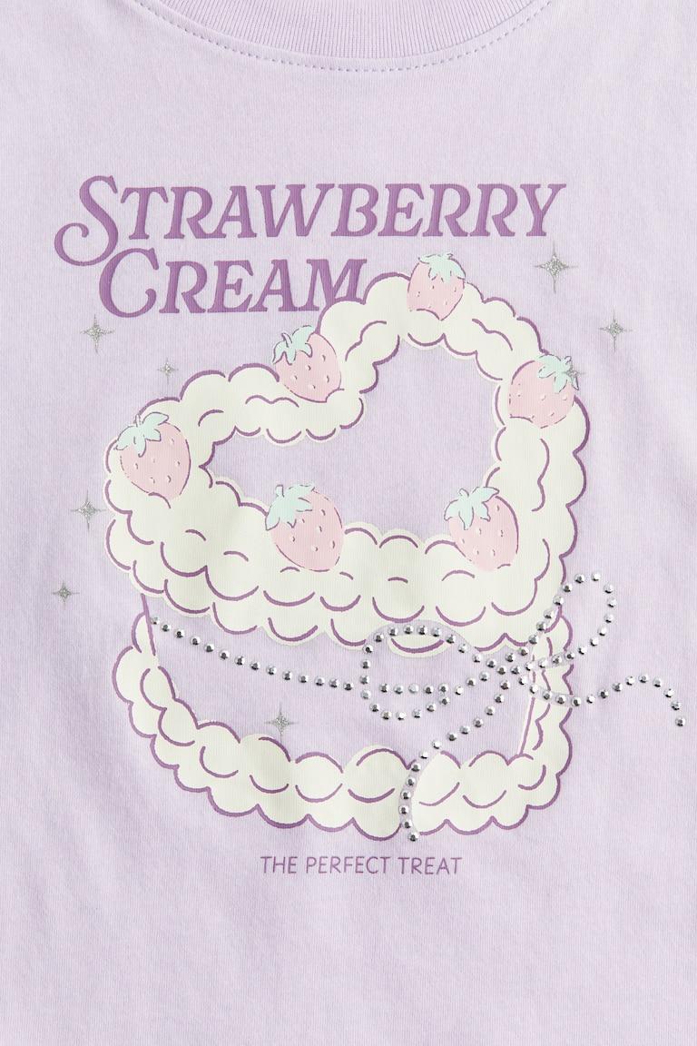 H&M T-Shirt mit Motiv Riesige Rabatte
