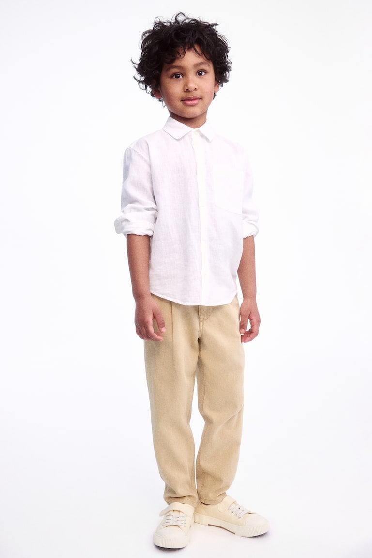 H&M Loose-fit tapered twill chinos Bestseller