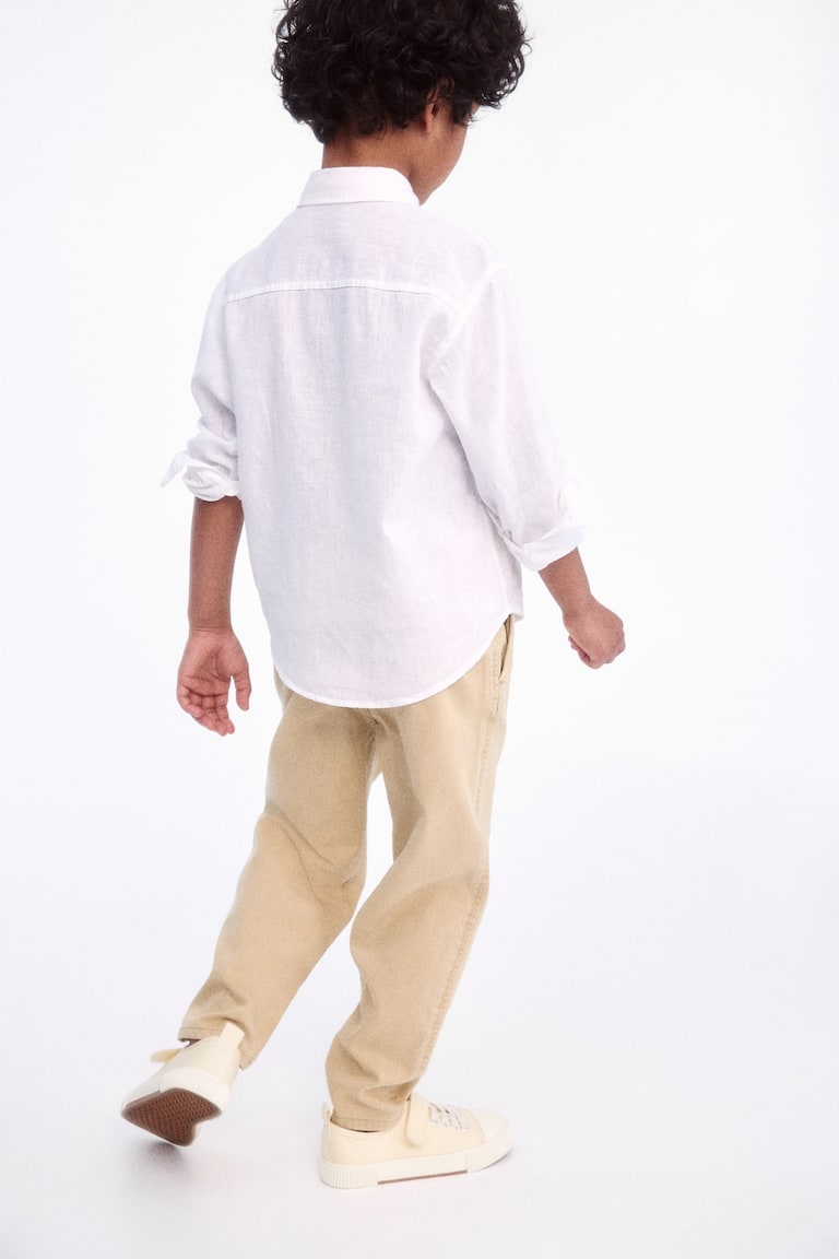 H&M Loose-fit tapered twill chinos Saisonale Angebote