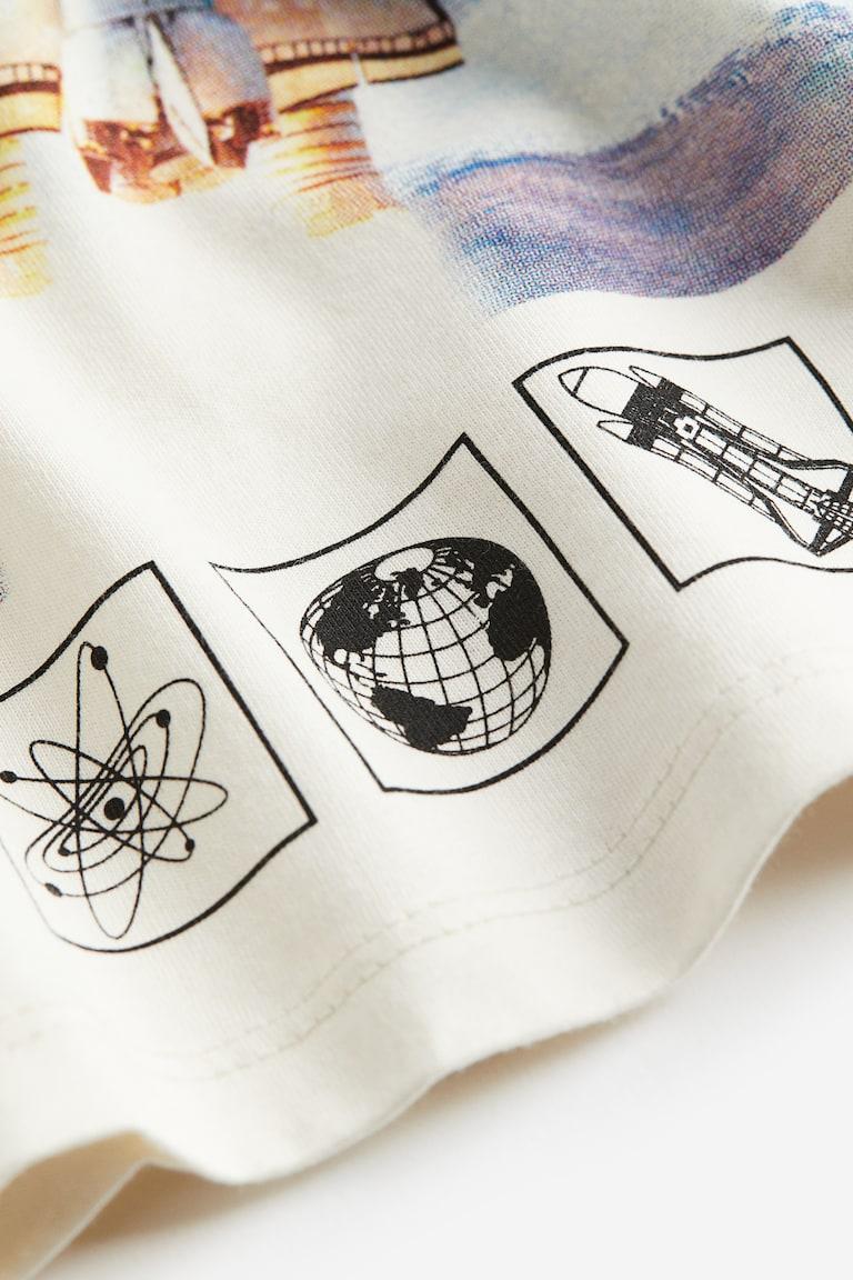 H&M T-Shirt mit Print Speichern exportieren