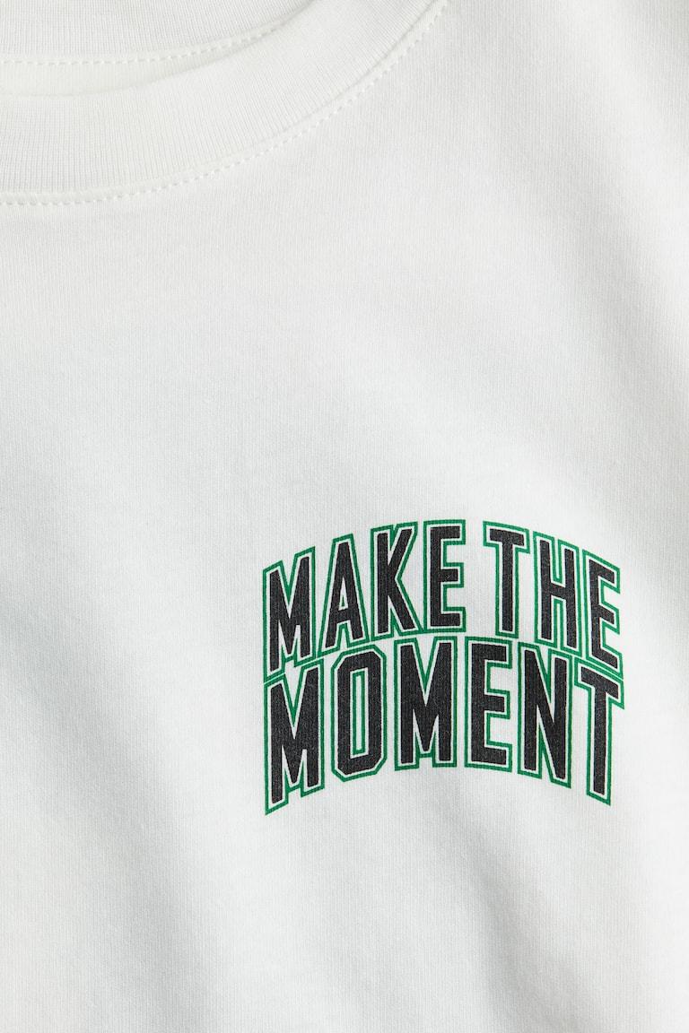 H&M T-Shirt mit Print Bis zu 65% Rabatt